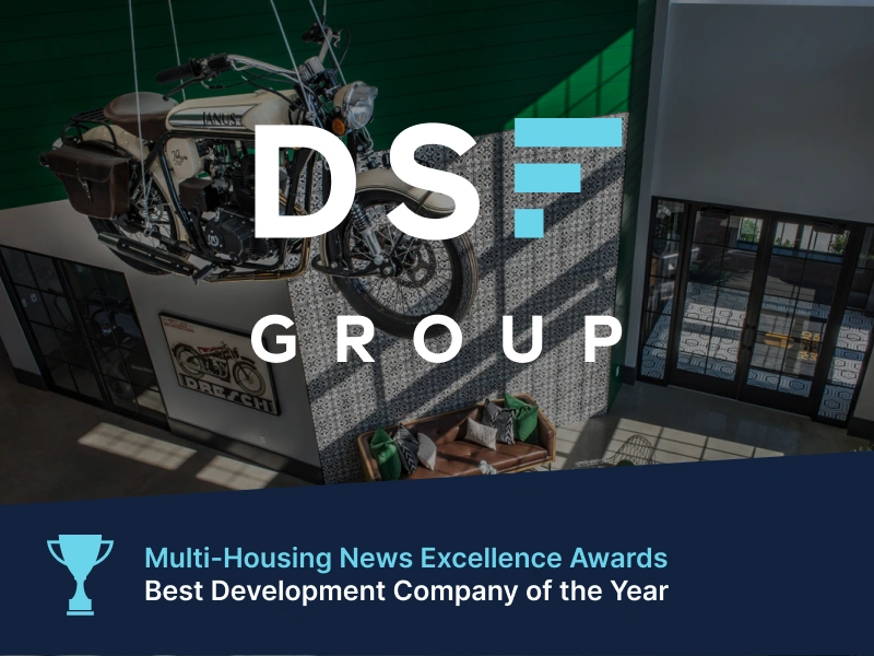 DSF Group interior with hanging motorcycle and stylish seating showcased in award graphic