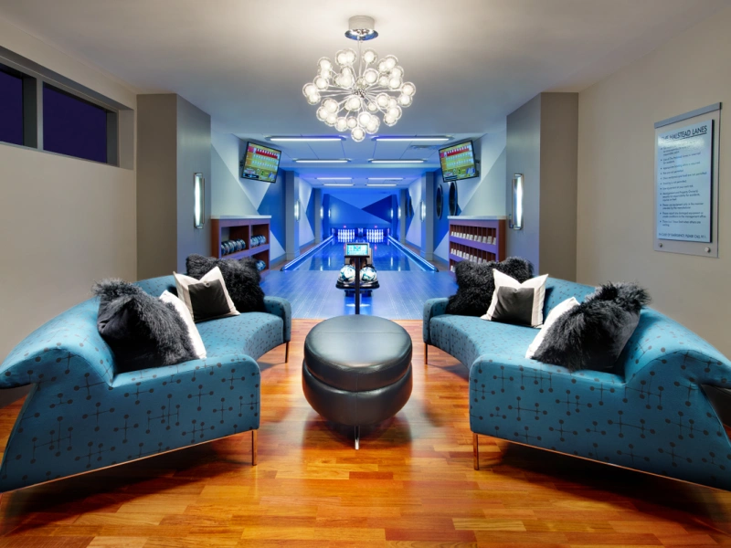 Private bowling alley with blue lighting at The Rockwell and The Lanes at Halstead Square