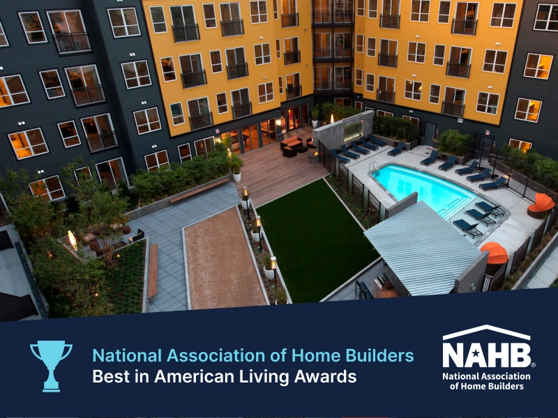 Award-winning outdoor living space featuring modern fire pit and stylish lounge furniture